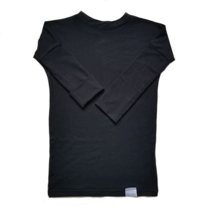 Black grow-with-me shirt for toddlers and kids, designed to be worn as a dress, tunic, or long shirt. Seamless shoulders and soft, eco-friendly fabric. Ethically made in Canada.