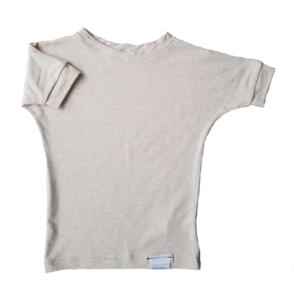 Heather Cream grow-with-me t-shirt for kids, made from soft Lyocell. Ethically made in Canada for a sustainable and comfy fit.
