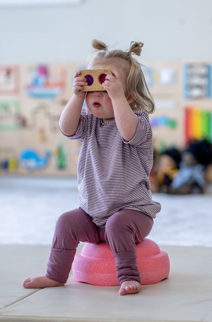 Rose Brown Stripes grow-with-me t-shirt for kids, made from soft organic cotton with a stretchy, foldable waistband. Ethically made in Canada for a sustainable and comfy fit.