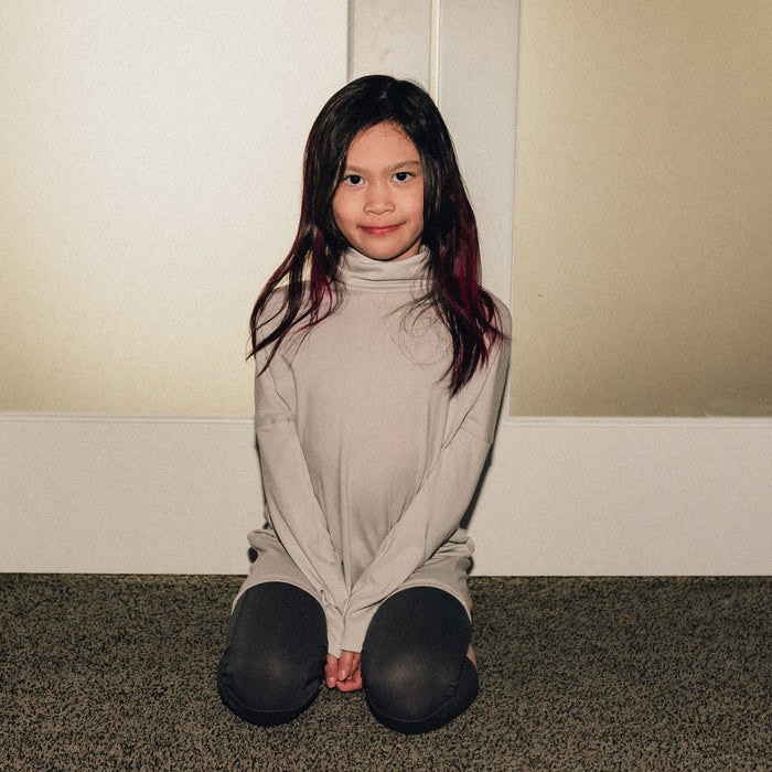 Eco-friendly kids' clothing – gender-neutral Light Grey Taupe grow with me turtleneck, sustainably made in Canada.
