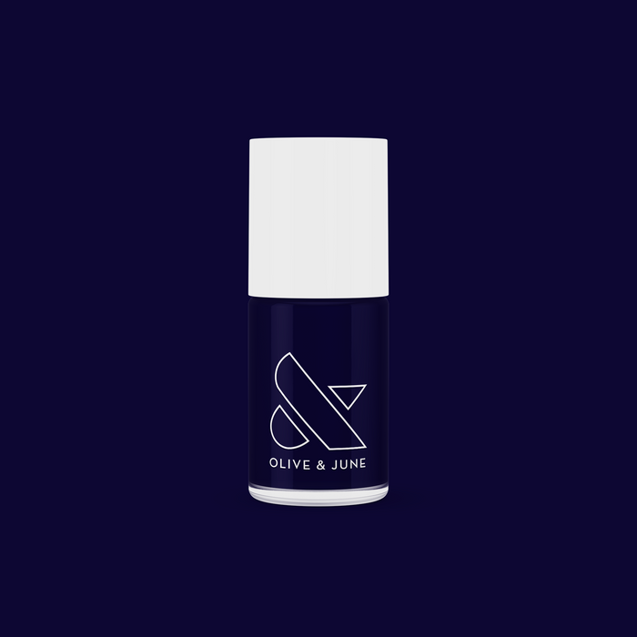 HJ nail polish bottle in shimmering inky navy by Olive and June for long-lasting at-home manicures and pedicures