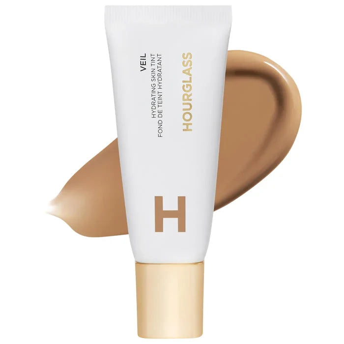 Hourglass Veil™ Hydrating Skin Tint Foundation in Shade 13, close-up of the sleek bottle with a smooth, hydrating skin tint visible inside.