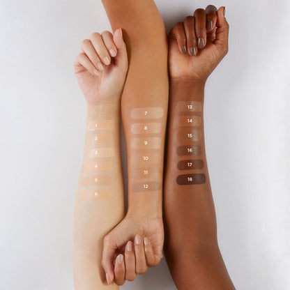 Hourglass Veil Hydrating Skin Tint Foundation Shade 13 NIB, close-up of the product bottle with sleek design and branding.