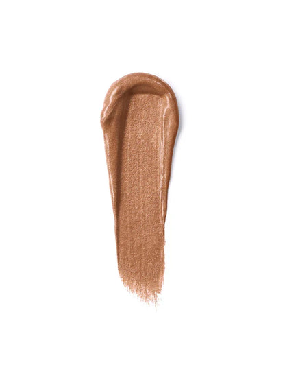 Swatch of Ilia Liquid Powder Eye Tint in burnish shade, showcasing matte and chromatic finish on the eyelid.