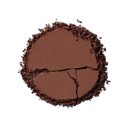 Ilia Nightlite Bronzing Powder in Songbird, a compact beauty product with warm bronze tones and subtle shimmer.