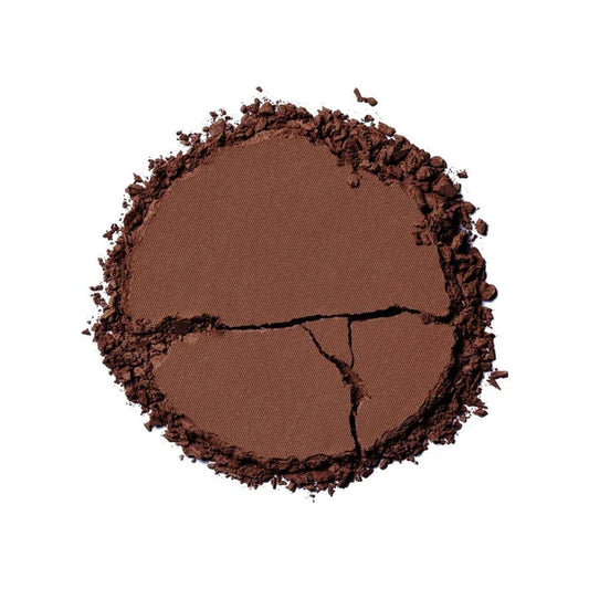 Ilia Nightlite Bronzing Powder in Songbird, a compact beauty product with warm bronze tones and subtle shimmer.