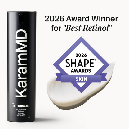 KaramMD Illuminate Anti-Aging Cream in a sleek black cylindrical bottle, shown next to a purple 2026 Shape Awards Skin badge and a smear of the white cream on a clean white background.