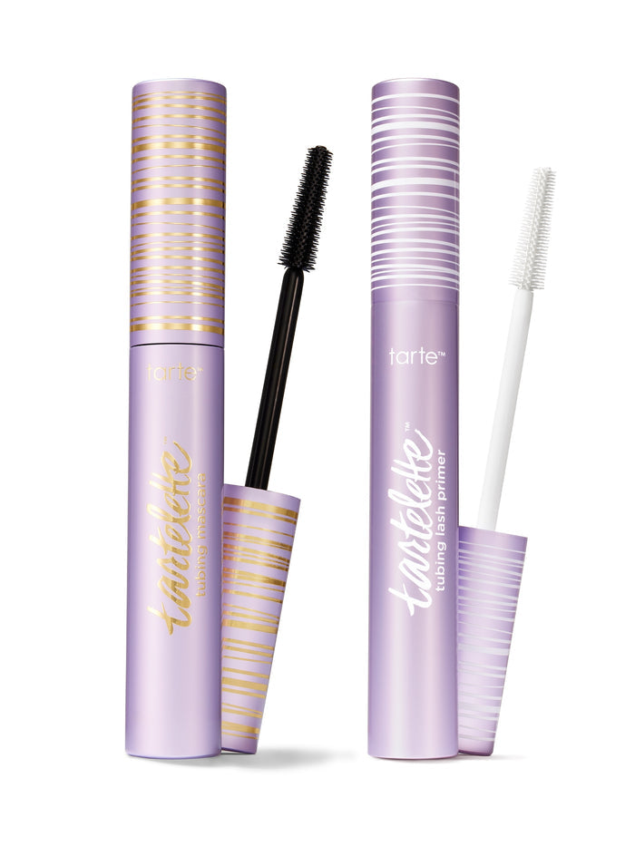 Tarte La Fille Mascara and Lash Primer with applicators on a white background