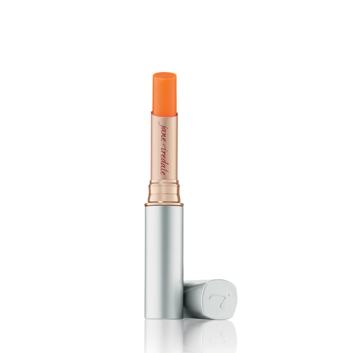 A single stick of Just Kissed Lip and Cheek Stain in color "Forever Peach", presented with its cap removed, against a white background.