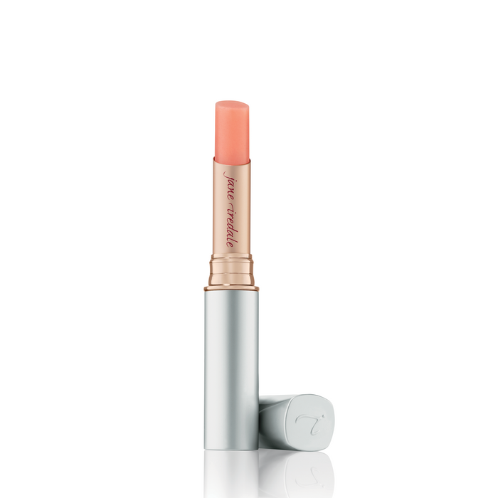 A single stick of Just Kissed Lip and Cheek Stain in color "Forever Pink", presented with its cap removed, against a white background.