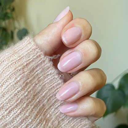 Kiss of Chrome quick dry polish on natural nails with a pearly sheer finish for a glossy at-home manicure
