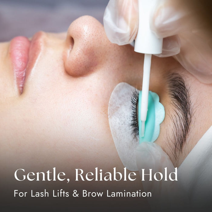 Person receiving lash lift or brow lamination with text 'Gentle, Reliable Hold For Lash Lifts & Brow Lamination'.