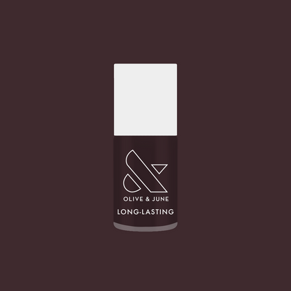 Let's Stay In gel polish bottle in ultra dark maroon-brown for a long-lasting manicure by Olive and June