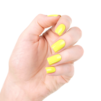 Limoncello vibrant yellow nail polish manicure on a light skin tone