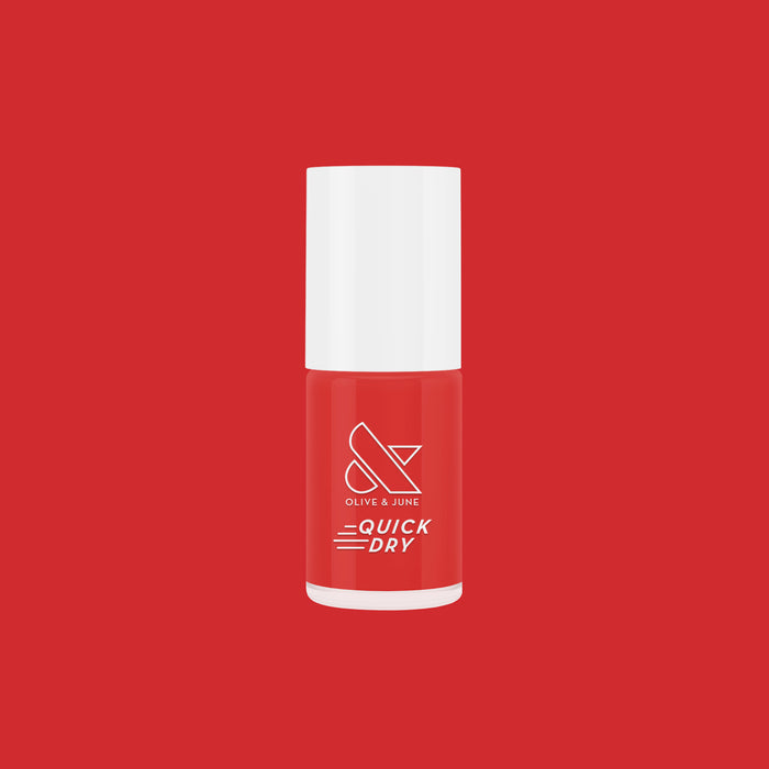 Olive and June Lippy quick dry nail polish bottle in bold glossy red shimmer on matching red background