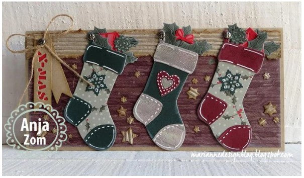 Marianne Design - Craftables Die - Stocking. Craftable Die Stocking. Use this stocking die to create a beautiful stocking card which can be accented with the small snowflake and heart die. The sizes are: Stocking 1 x 3 Snowflake and Heart 1 x 1 in. Available at Embellish Away located in Bowmanville Ontario Canada. Card by brand ambassador.