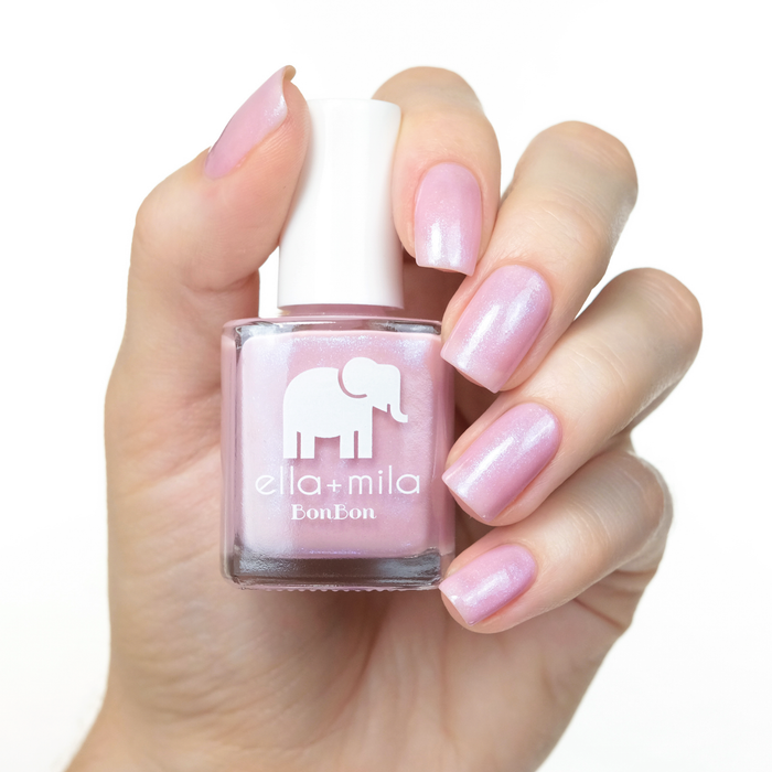 Midnight in Paris iridescent lavender pink nail polish manicure on a light skin tone