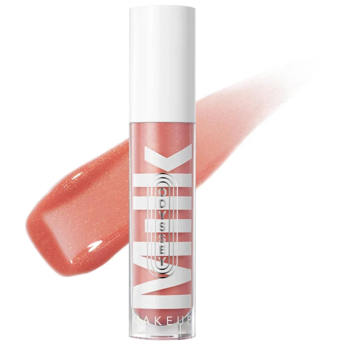 Milk Makeup Odyssey Hydrating Lip Oil Gloss in various shades, featuring a non-sticky, glossy finish in a sleek beauty product container.