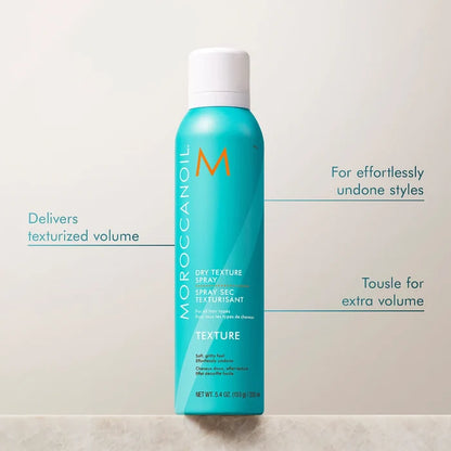 Moroccanoil Dry Texture Spray in 5.4oz bottle, showing the product with a sleek design and spray nozzle for creating textured hairstyles.