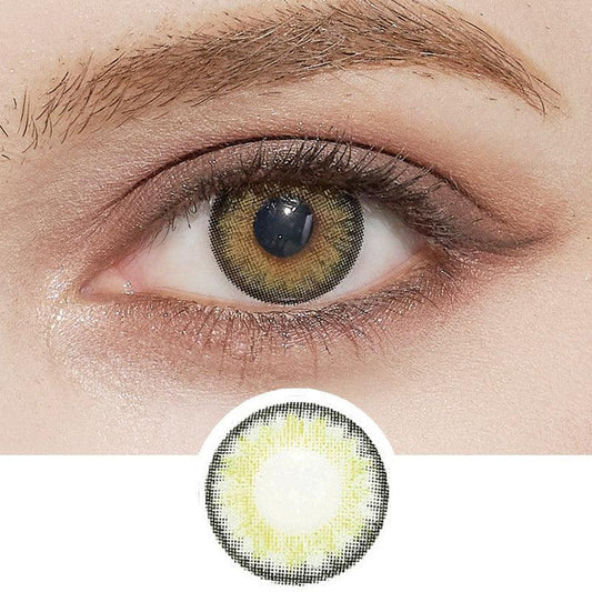 A close-up of a human eye wearing NEO Vision's Cosmo Green contact lens, with an inset image below displaying the design of this cosmetic lens.