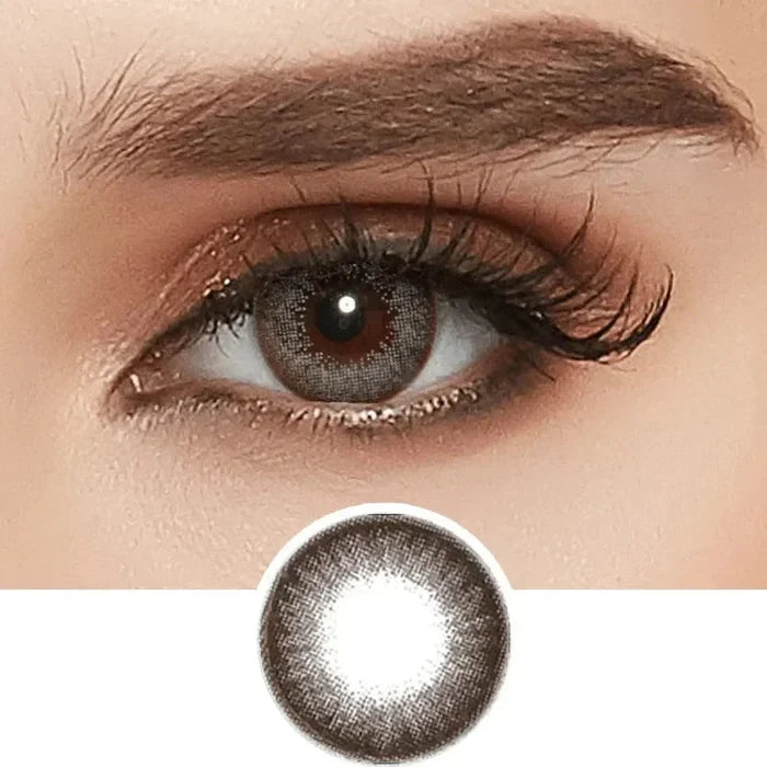 A close-up shows an eye with long lashes, brown eyeshadow, and the NEO Vision Extra Dali Grey contact lens by NEO Vision; below is a separate image of this grey circle lens.