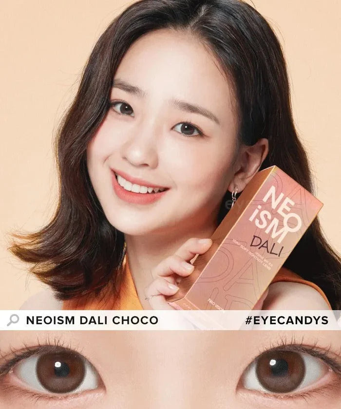 A smiling woman with shoulder-length hair holds a box labeled "NEO Vision Neoism Dali Choco 1-Day (50pk)." Her brown eyes, brightened by NEO Vision daily lenses, shine in the close-up. Text: "NEOISM DALI CHOCO" and "#EYECANDYS.