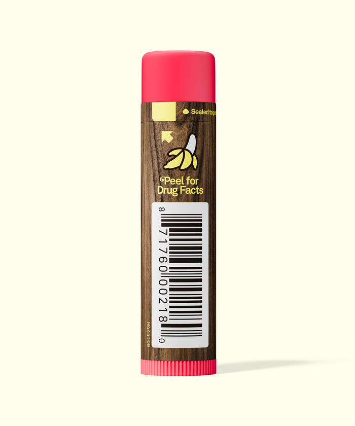 Lip balm with a brown label and pink cap on a white background