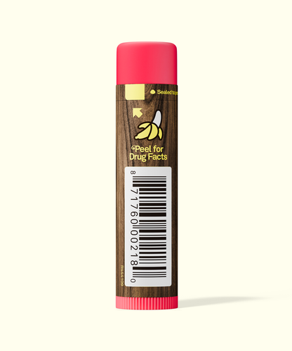 Lip balm with a brown label and pink cap on a white background
