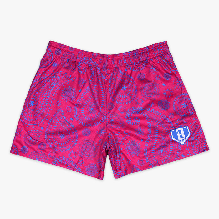 Pink and blue Paisley youth shorts — front view