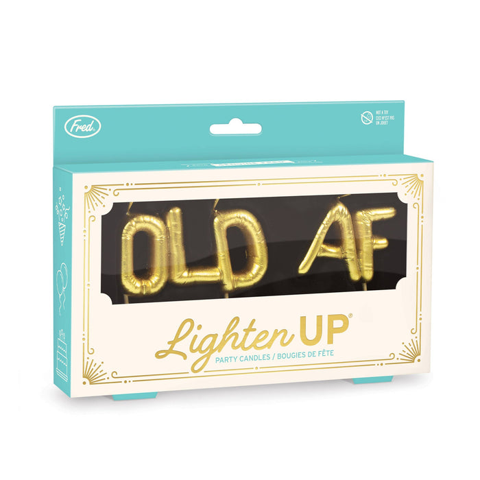 Fred & Friends Old AF party candles featuring humorous, vintage-style candles with bold black lettering on a white background.