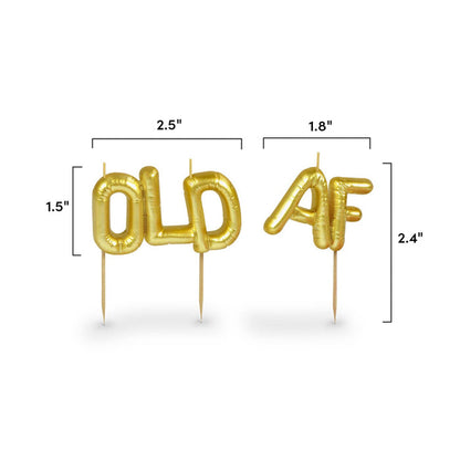 Pair of Fred & Friends Old AF party candles with humorous, vintage-style design, perfect for celebration decorations.