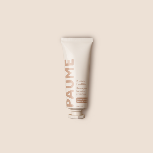 PAUME Probiotic Hand Balm tube showing the sleek, minimalist packaging with product name visible for soothing, nourishing hand care.