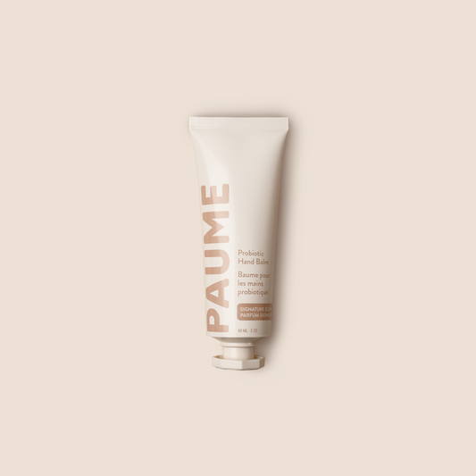 PAUME Probiotic Hand Balm tube showing the sleek, minimalist packaging with product name visible for soothing, nourishing hand care.
