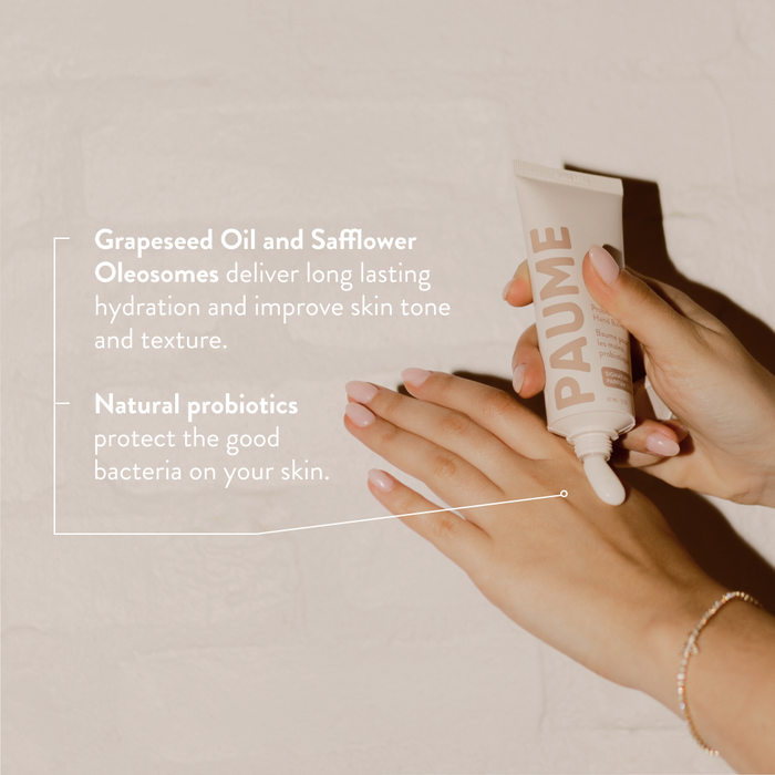 PAUME Probiotic Hand Balm jar with cream visible, showcasing smooth texture and clean packaging for nourishing hand care.