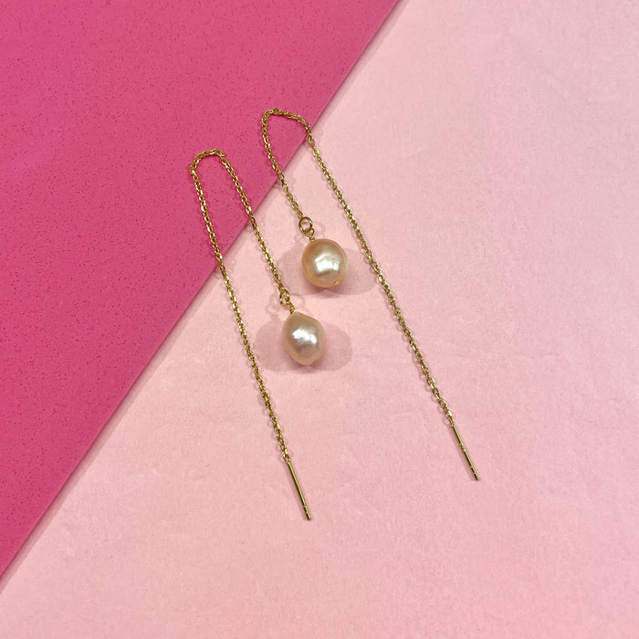 Pearls on a string - peachy