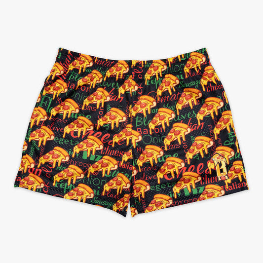Youth model wearing multi-color youth shorts with “Pizza” design