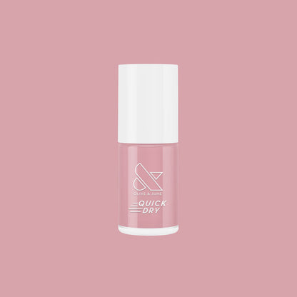Bottle of Poodle quick dry nail polish in neutral beigey pink for at-home manicure and pedicure use