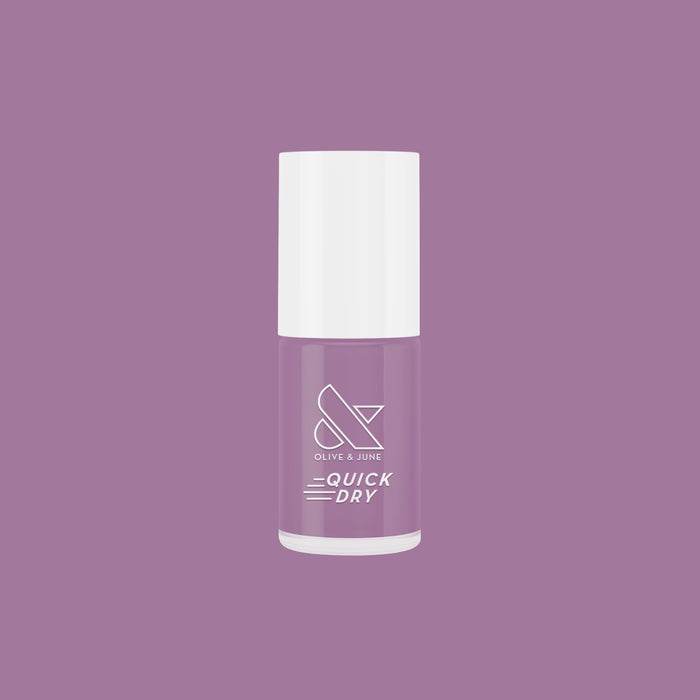 Bottle of Prairie quick dry nail polish in soft blooming purple by Olive and June for easy at-home manicures