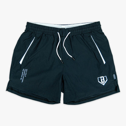 Black and white Pro Series youth shorts — front view