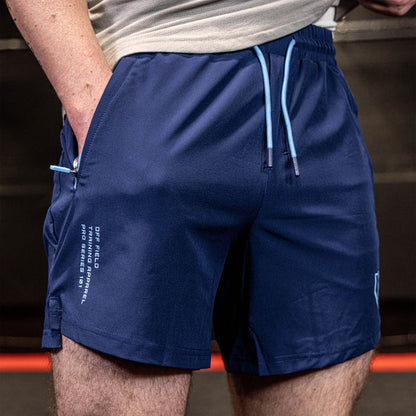 Youth model wearing navy and light blue Pro Series with Liner youth shorts