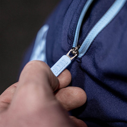 Youth model wearing navy and light blue Pro Series with Liner youth shorts