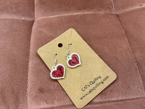 Cat's Quilling Quilled Heart Earrings, handcrafted jewelry with delicate heart-shaped paper designs, hanging from silver hooks.
