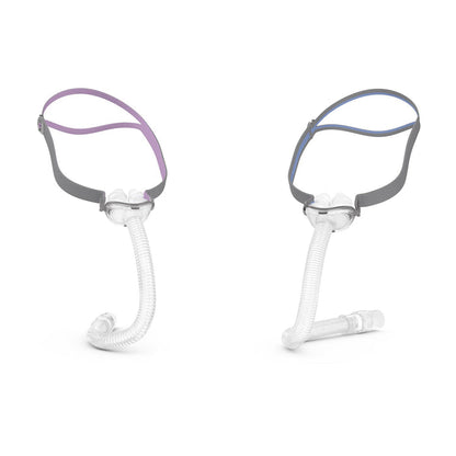 ResMed AirFit P10 Nasal Pillow Masks – a comparison of the standard version (with blue headgear) and the 'For Her' version (with purple headgear). Both masks feature a lightweight design, minimal headgear, and a flexible short tube for a comfortable and quiet CPAP therapy experience.