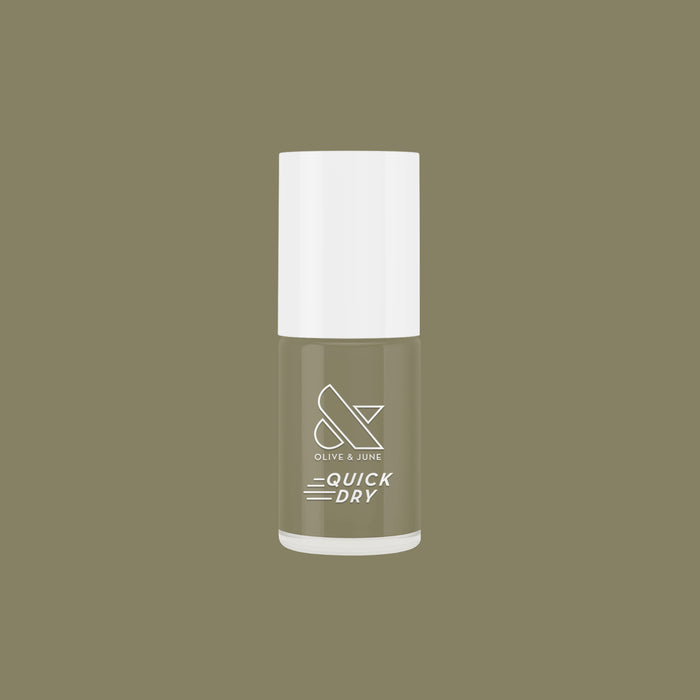 Bottle of Olive and June Sagey quick dry nail polish against matching green background