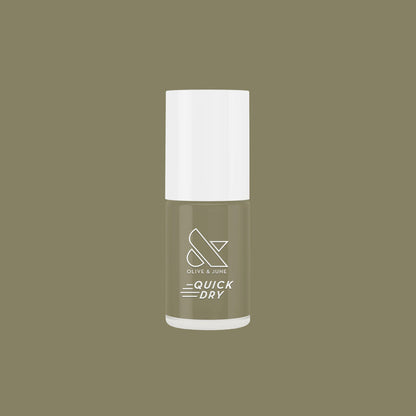 Bottle of Olive and June Sagey quick dry nail polish against matching green background