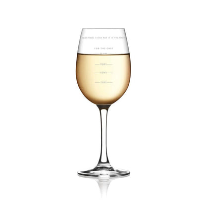 Fred & Friends Sauced Measurer Wine Glass gift, clear glass with measurement markings for wine pouring and tasting.