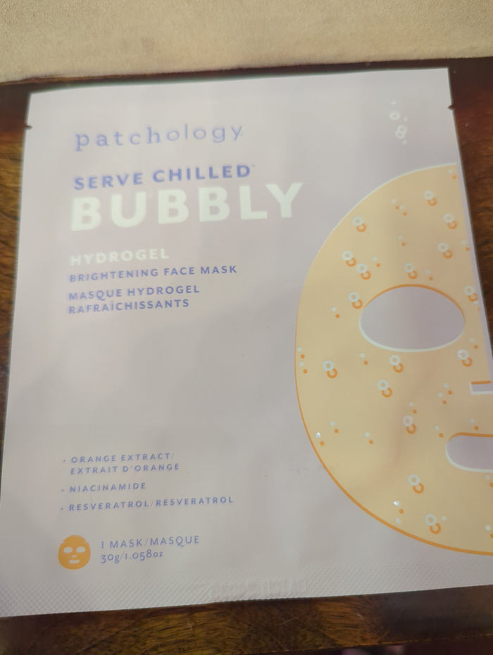 Patchology Serve Chilled Bubbly Brightening Hydrogel Facial Mask, single pack, showing the cooling, bubbly hydrogel mask on a model's face.