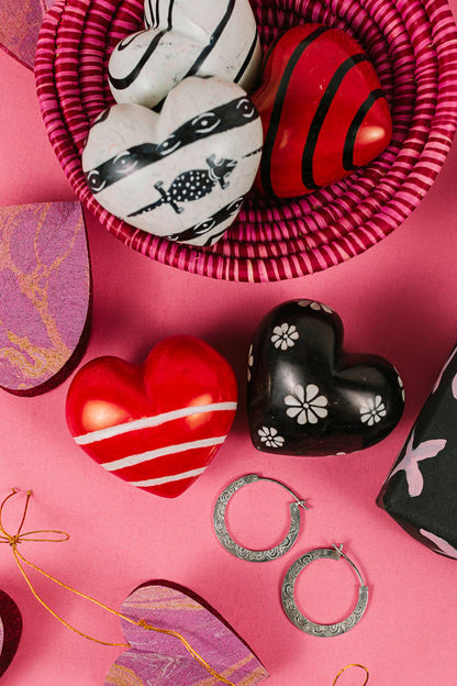 Colorful Share the Love paperweight from Ten Thousand Villages Delights collection, featuring a vibrant, handcrafted design.