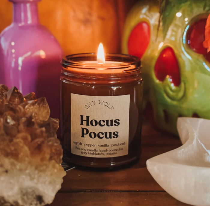 Shy Wolf Candles Hocus Pocus scented candle in a decorative jar, perfect for home decor and cozy ambiance.