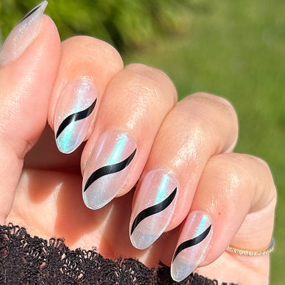 Simple Twist - Press-On | Medium | Almond nails with neutral shimmer base and sleek black twist for an easy press-on mani